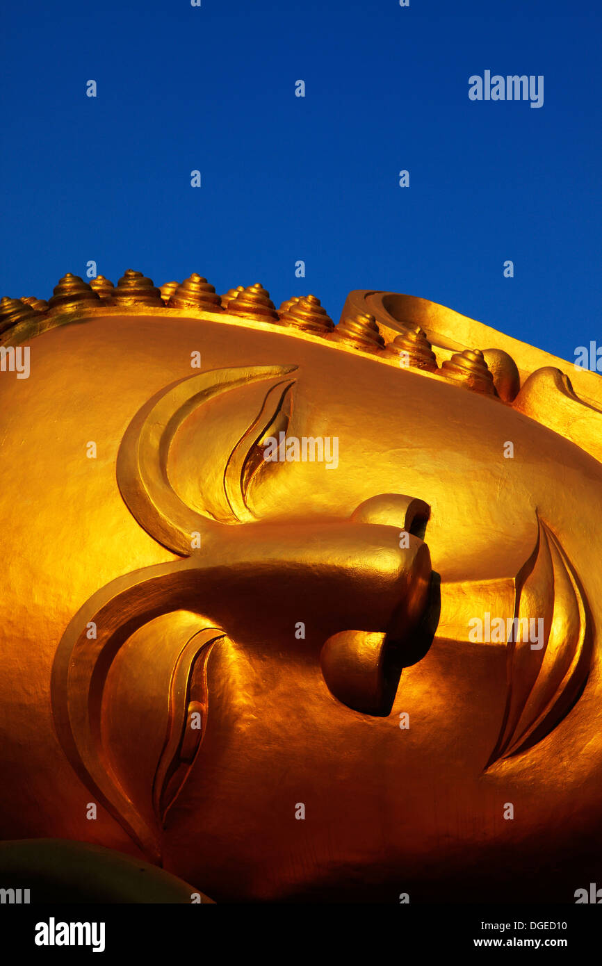 Reclining Buddha at Pha That Luang, Vientiane, Laos Stock Photo
