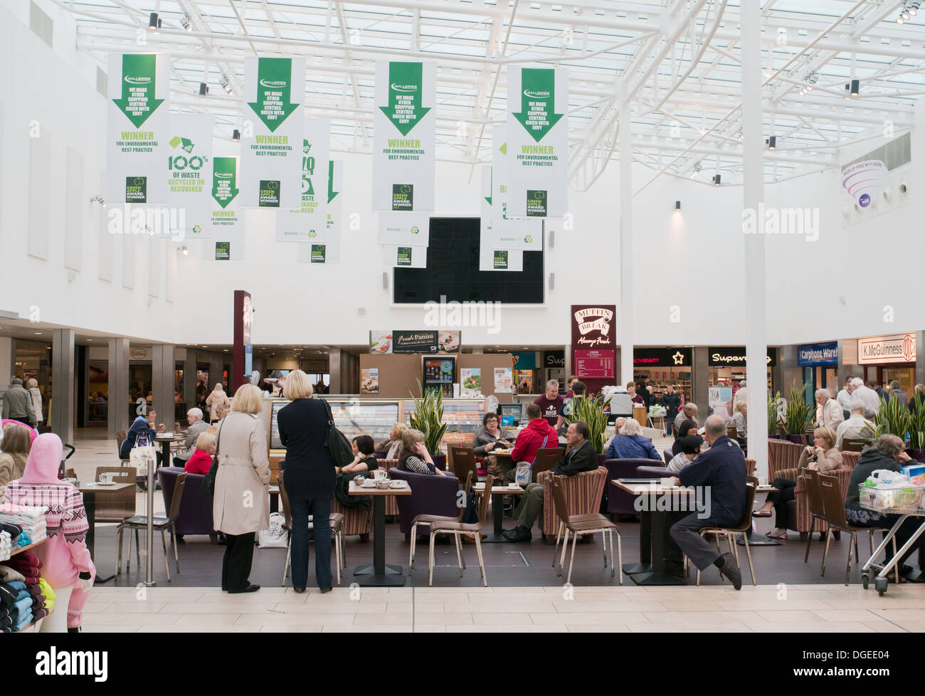 People seated at café within the atrium at Washington Galleries shopping centre, north east England, UK Stock Photo