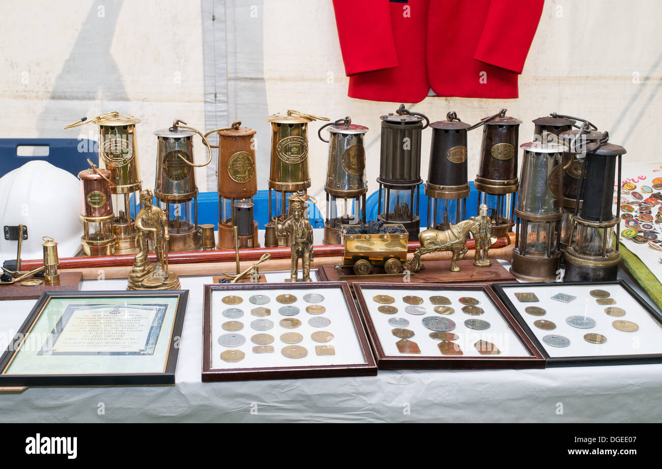 A display of mining memorabilia including miners safety lamps, Washington Heritage and Community Festival north east England, UK Stock Photo