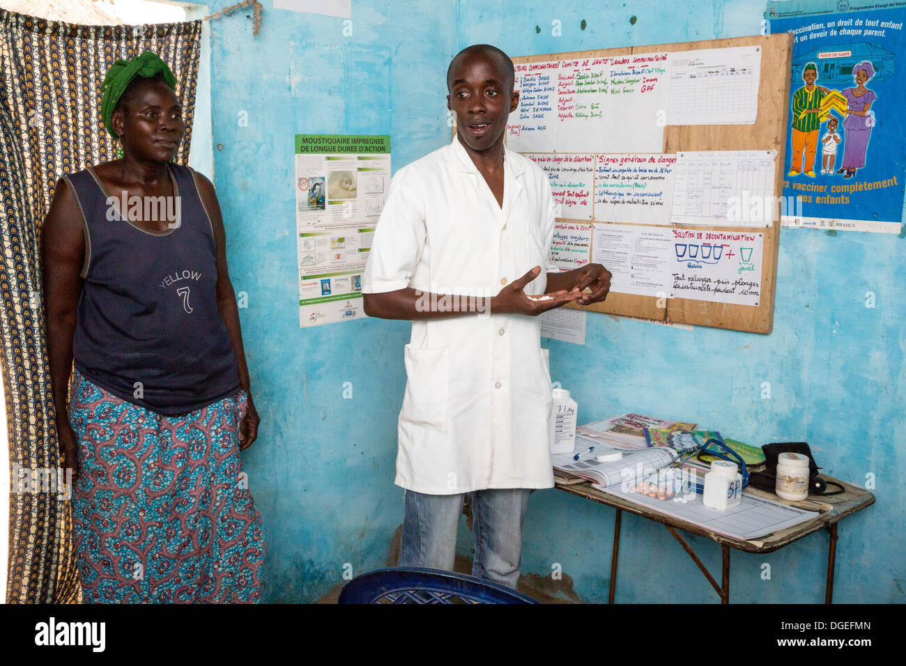 Male Health Care Practitioner and Patient, Nixo Village Health Clinic, near Sokone, Senegal Stock Photo