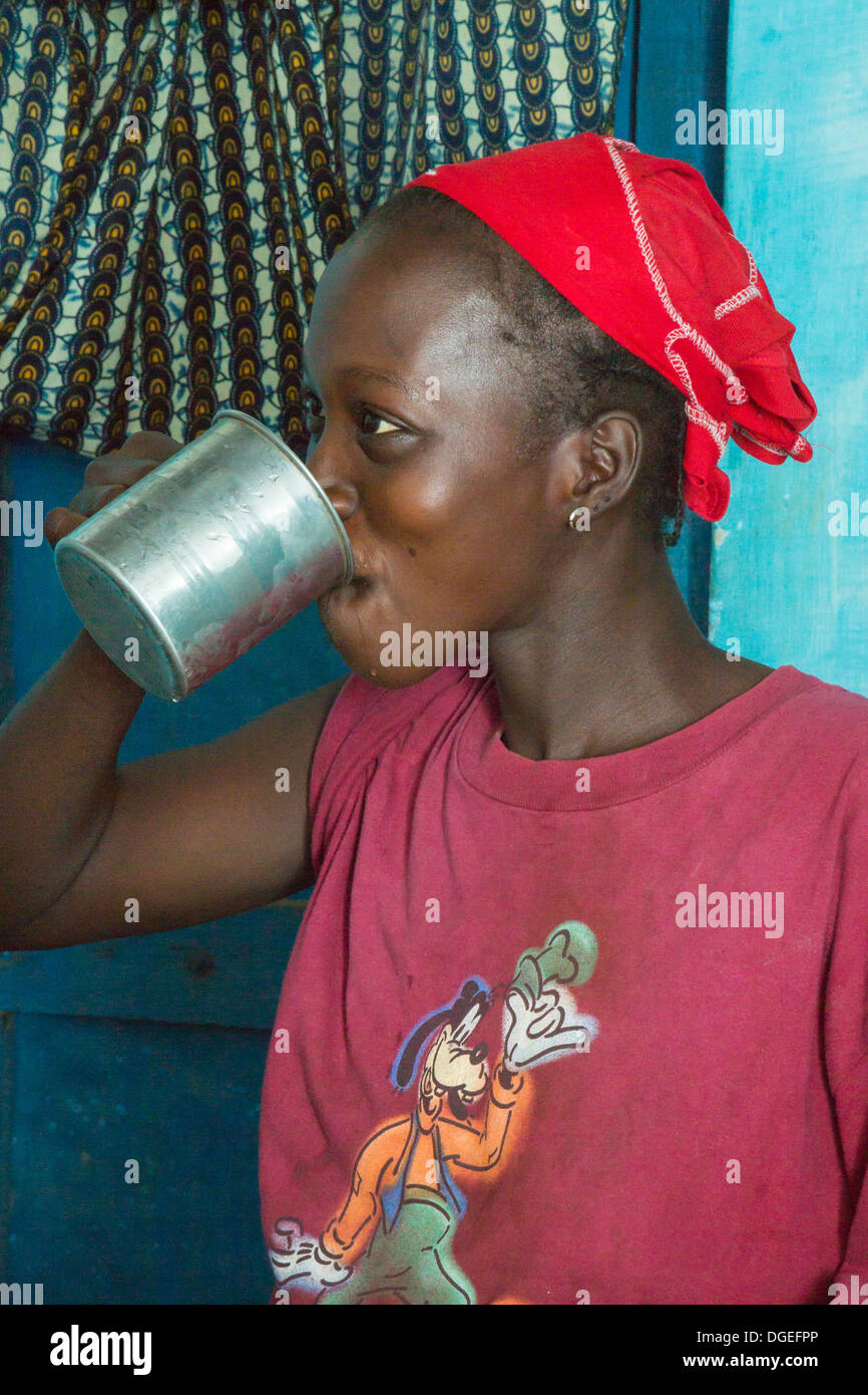 Female Patient at Nixo Village Health Clinic Takes her Medication, near Sokone, Senegal Stock Photo