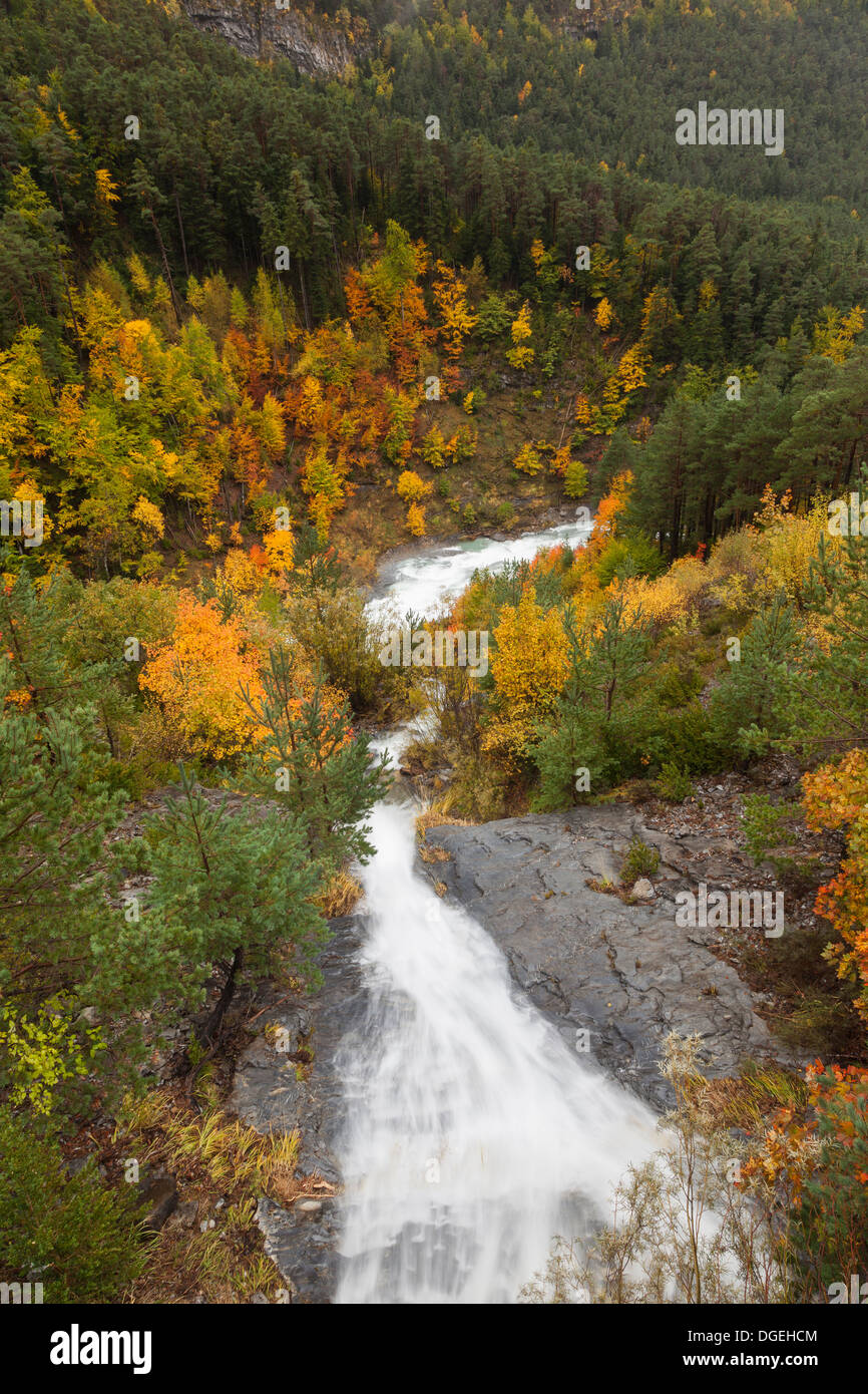 Waterfall and forest in autumn, Ordesa National Park, Huesca, Aragon, Spain, Europe Stock Photo