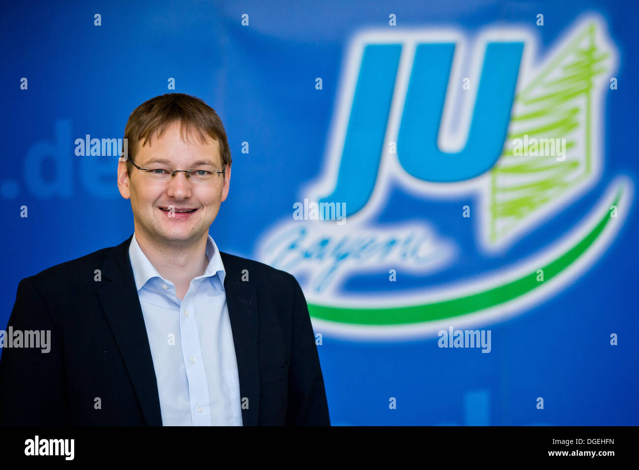 Nuremberg, Germany. 19th Oct, 2013. The new chairman of the Young Union in Bavaria, Hans Reichhart, smiles at the Young Union party meeting in Nuremberg, Germany, 19 October 2013. Photo: Daniel Karmann/dpa/Alamy Live News Stock Photo