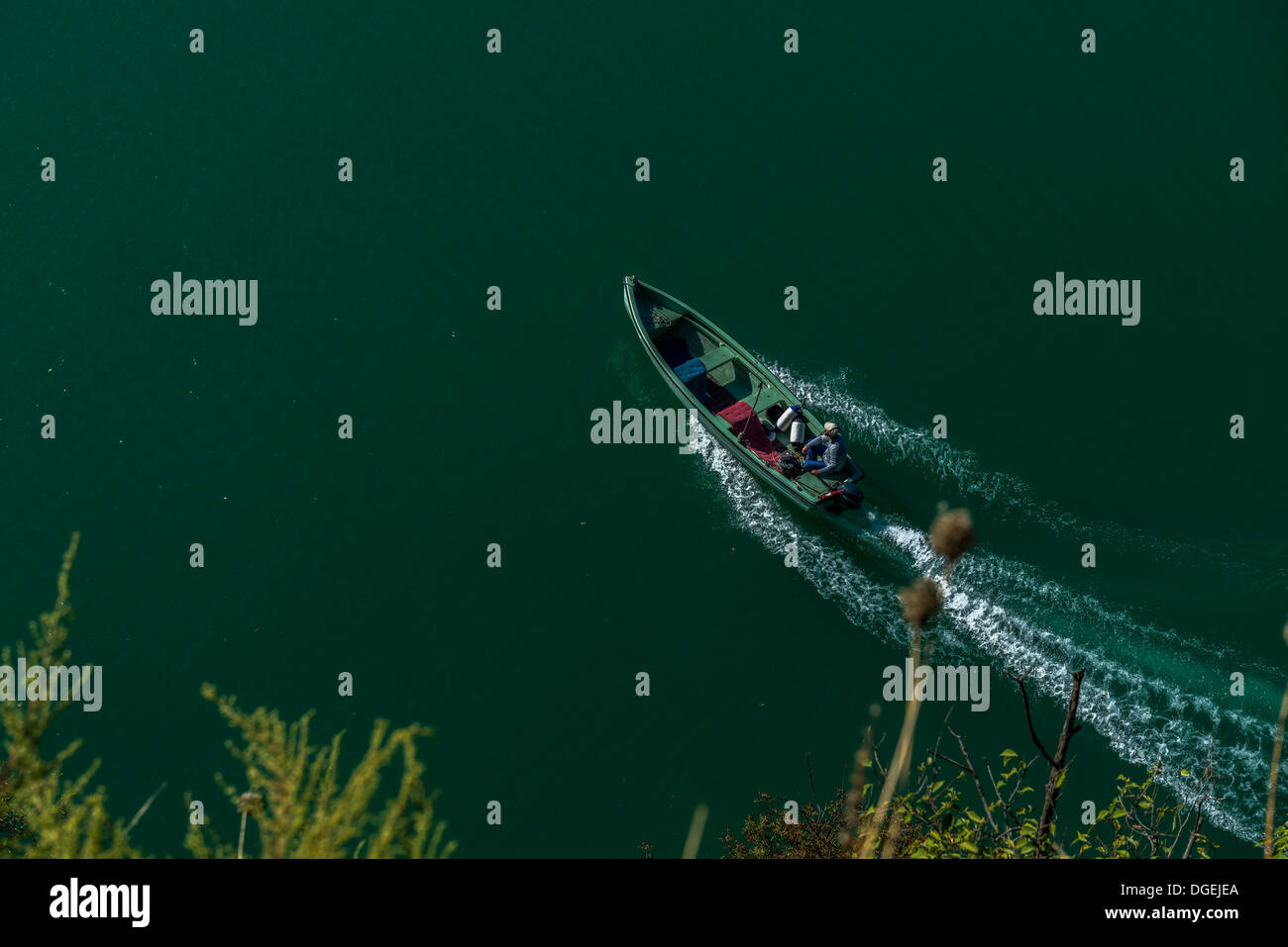 A small fishing boat on Lake Lugano. Ticino. Switzerland Stock Photo