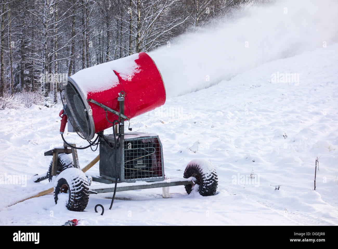 Snow cannon at a ski slope Stock Photo Alamy