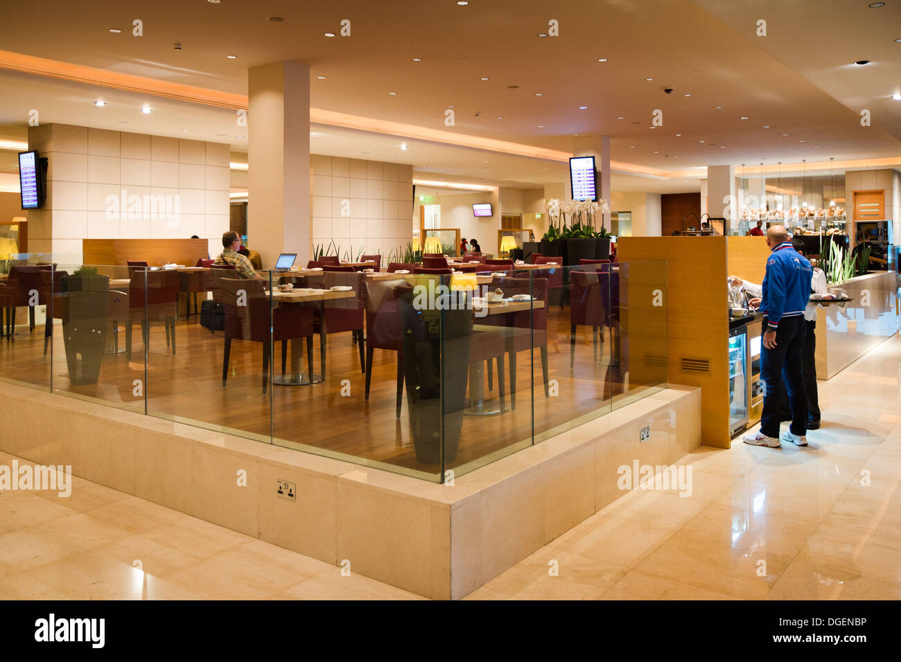 Qatar, U.A.E. Doha Airport, passengers in Premium Business Class Terminal dining area Stock Photo