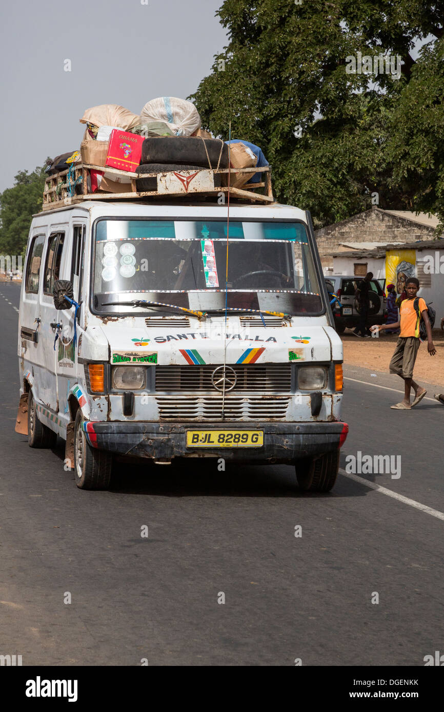 Local Bus Transport, Weekly Market at Fass Njaga Choi, North Bank Region, The Gambia. Stock Photo