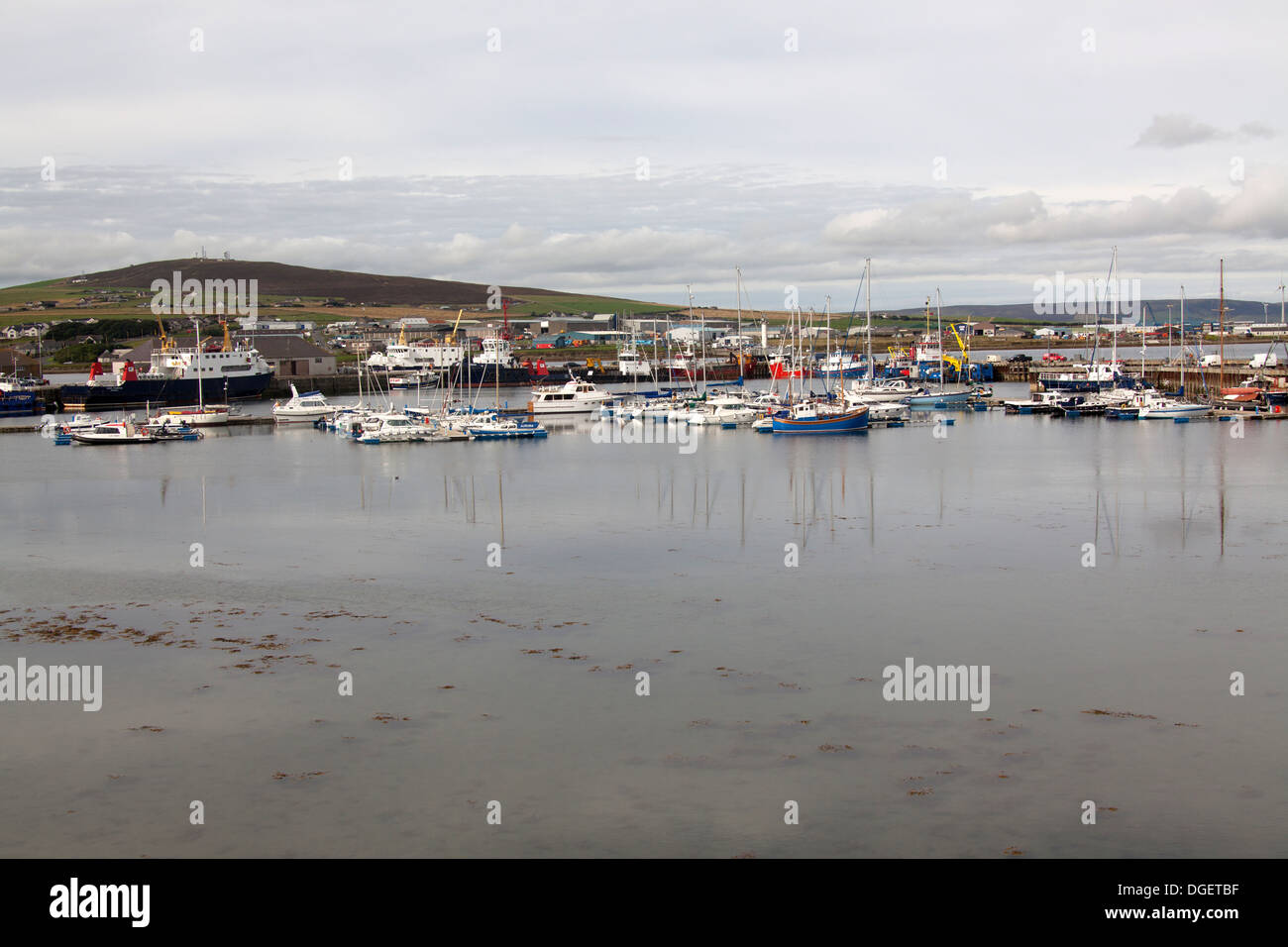 Islands of Orkney, Scotland. View of Kirkwall marina and harbour, with the industrial estate in the background. Stock Photo