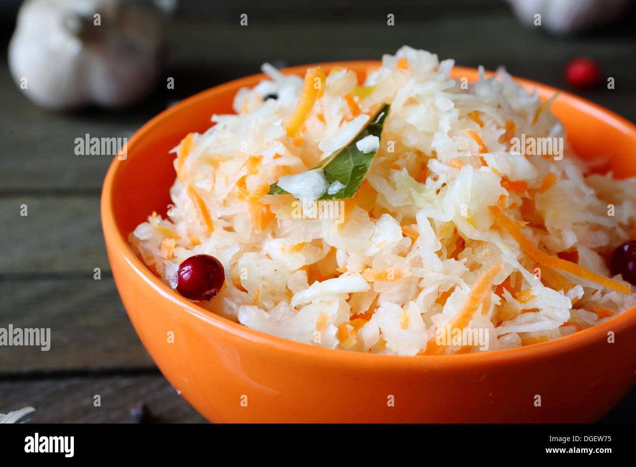 delicious sauerkraut with garlic and cranberries, food close up Stock Photo