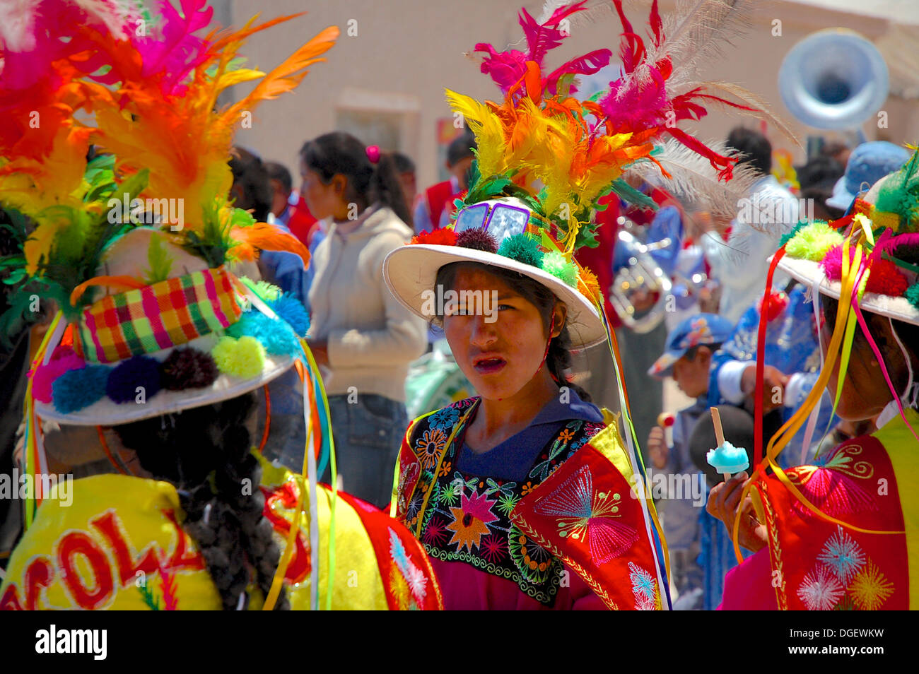 Girls in colorful traditional costumes during a religious procession near Uyuni, Bolivia Stock Photo
