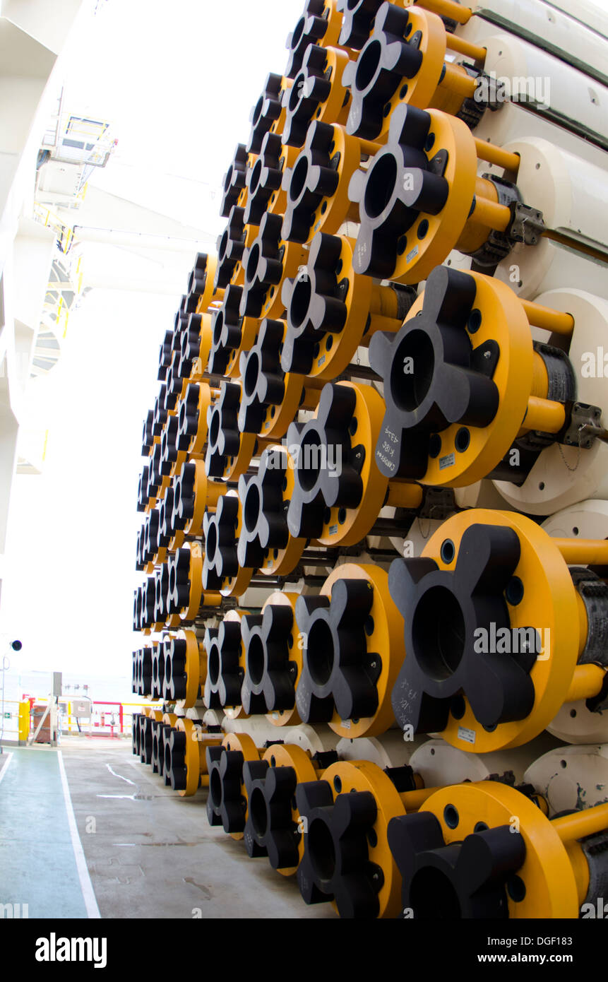 Drill pipes pile at deck on offshore ultra deep waters drill ship Ocean Rig Mykonos, working in Brazil for Petrobras Stock Photo