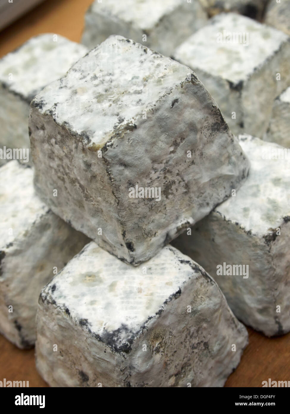 Local, artisan cheeses for sale at the Bath farmer's market, England Stock Photo