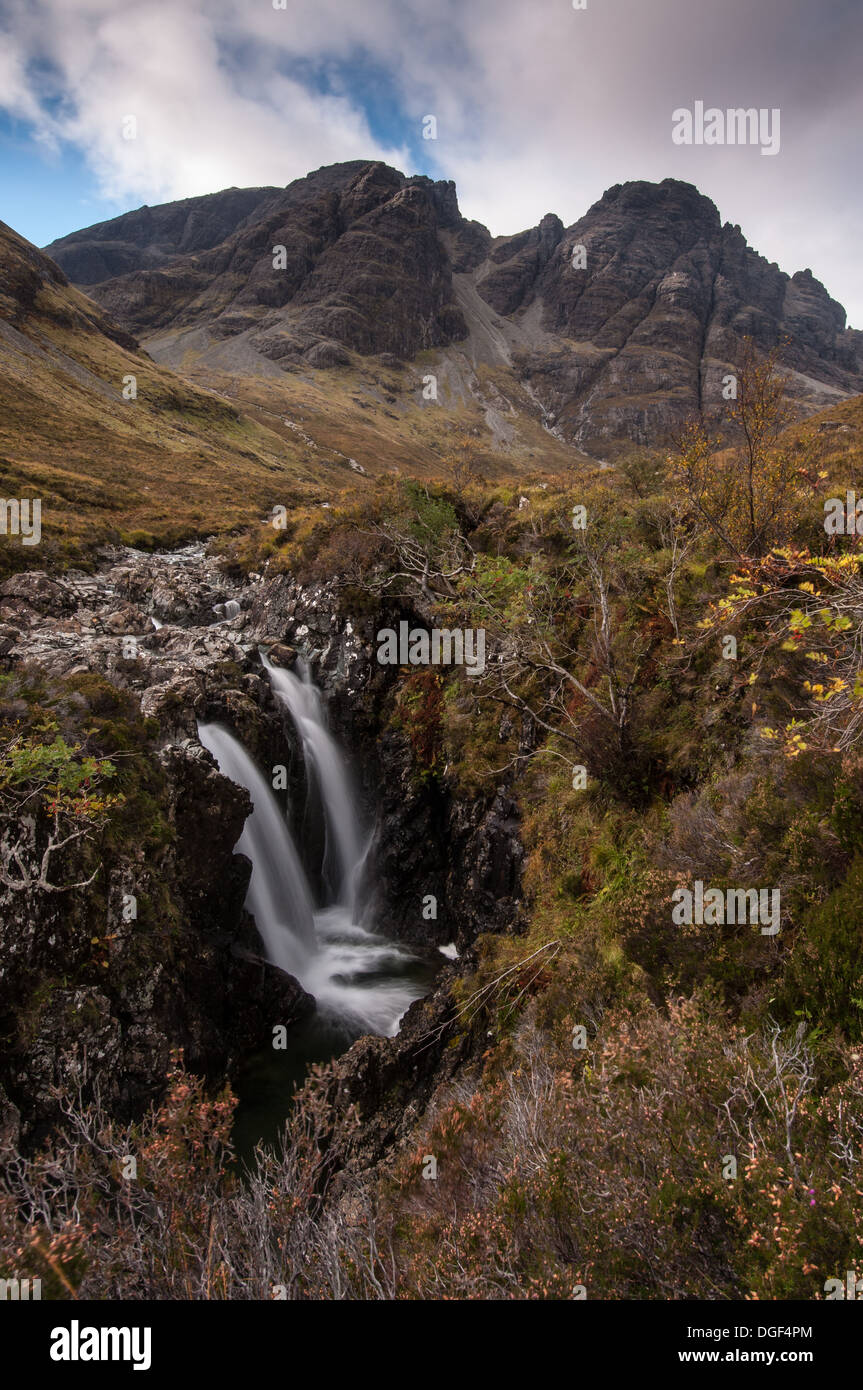 Waterfall on the Allt na Dunaiche, with Bla Bheinn and Clach Glas in the background, Isle of Skye Stock Photo