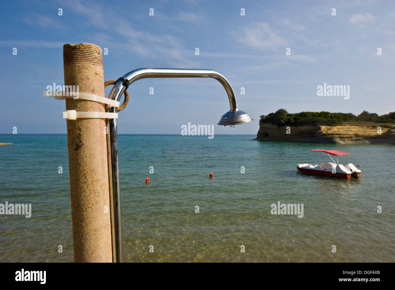 An outdoor shower on the beach in Sidari on Corfu Island Stock Photo