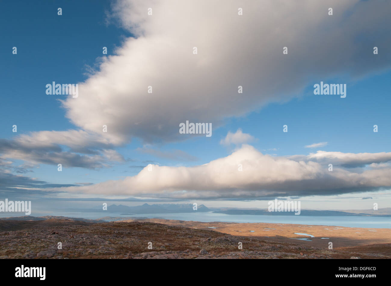Dramatic cloud over the Isle of Skye in the view from the summit of the Bealach na Ba mountain pass, Scottish Highlands Stock Photo