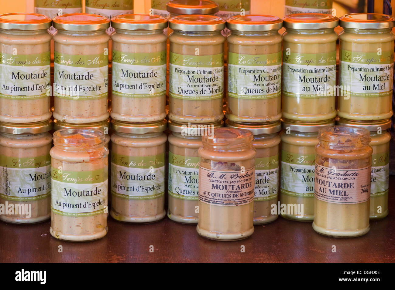 Jars of French Mustard for sale on a market stall Stock Photo Alamy