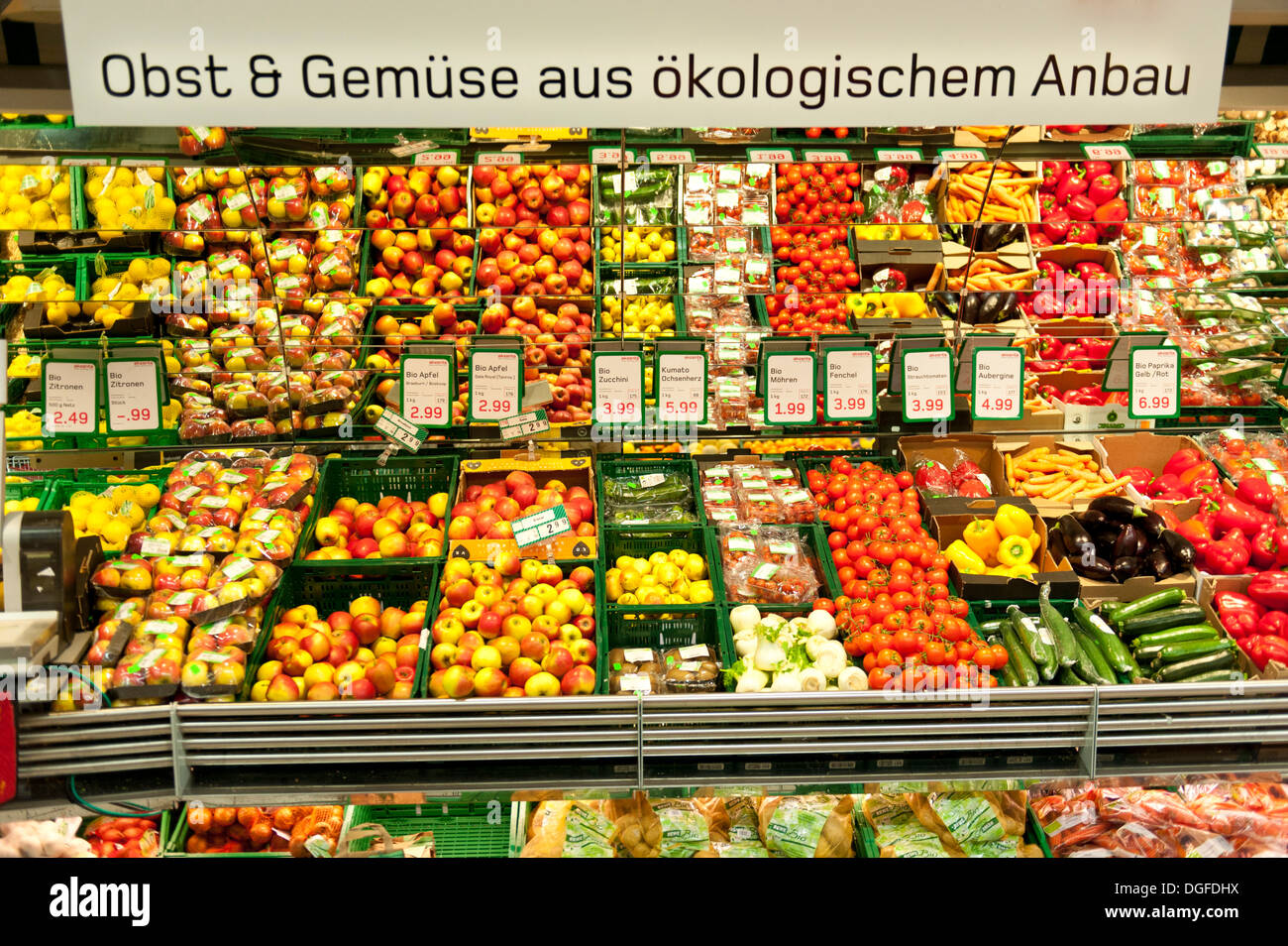 Sign in German 'Obst und Gemüse aus ökologischem Anbau', fresh organic fruit and vegetables, display in a supermarket Stock Photo