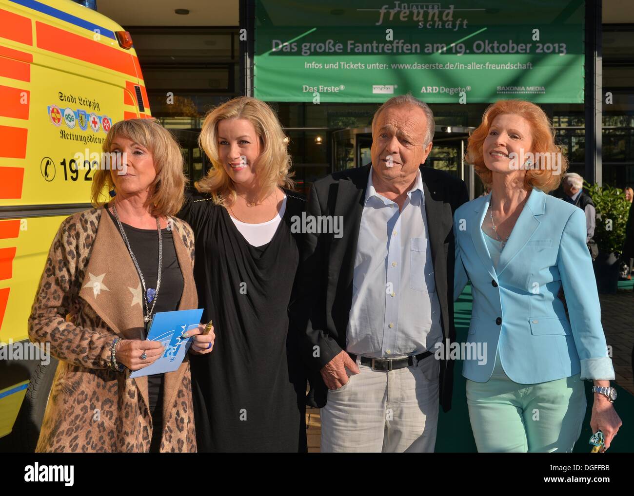 Leipzig, Germany. 19th Oct, 2013. The actors (L-R) Uta Schorn, Alexa Maria Surholt, Dieter Bellmann and Jutta Kammann open the fan festival of the ARD television series 'In aller Freundschaft' to mark its 15th anniversary in Leipzig, Germany, 19 October 2013. Photo: Hendrik Schmidt/dpa/Alamy Live News Stock Photo