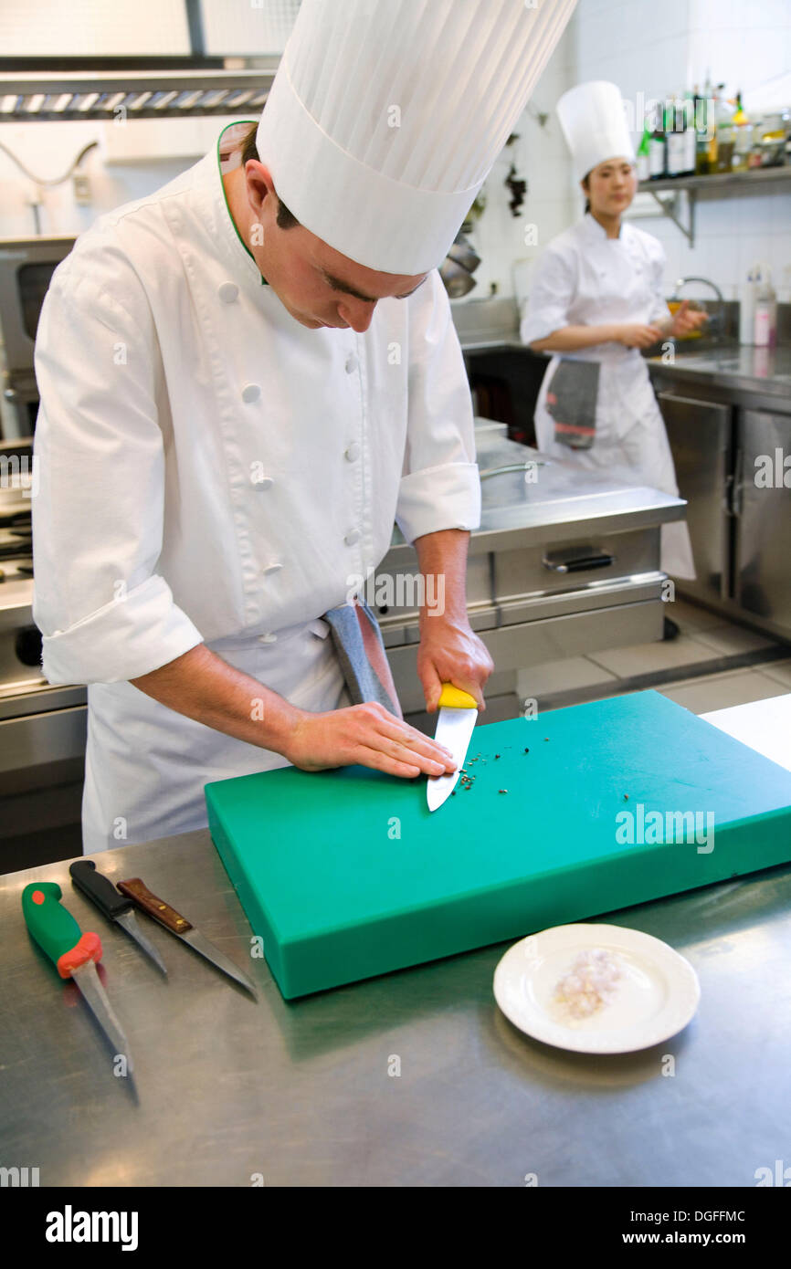Chefs chopping up black pepper. Luis Irizar cooking school. Donostia