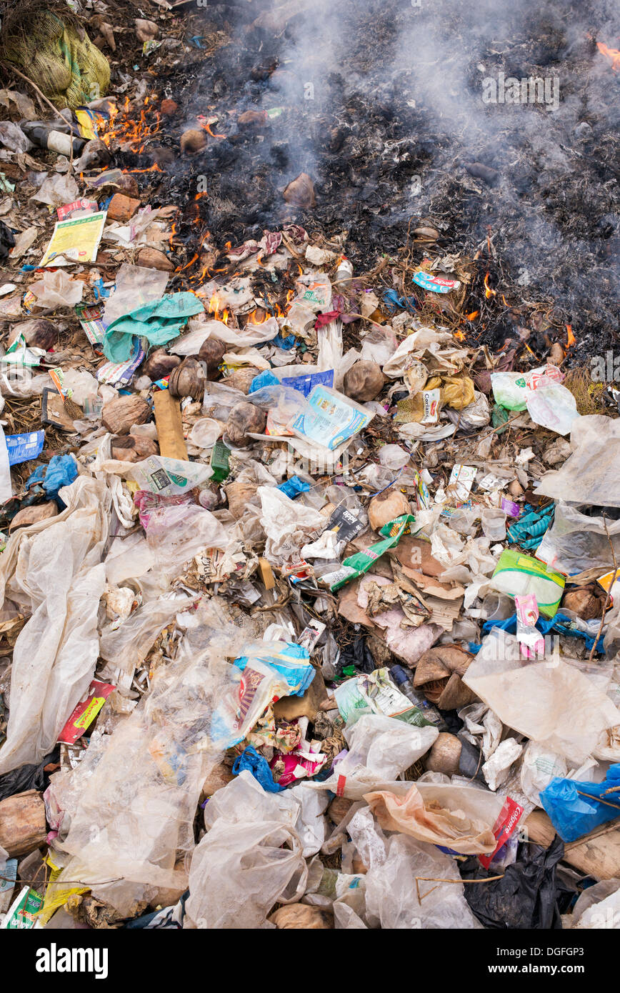 Burning plastic waste in the Indian countryside Stock Photo