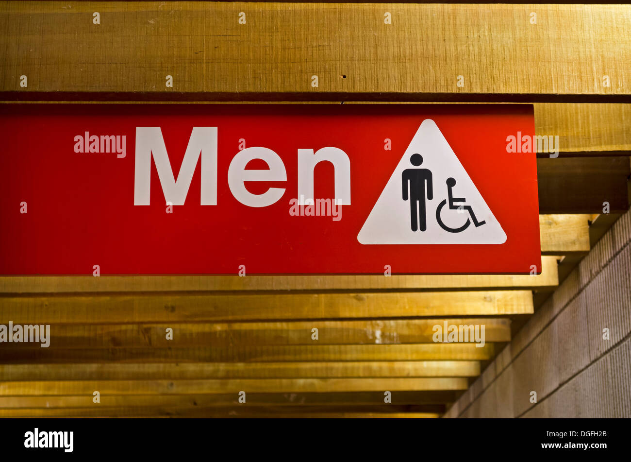 Men's public washroom toilet sign.   Bathroom sign for men and people with handicaps or disabilities. Stock Photo