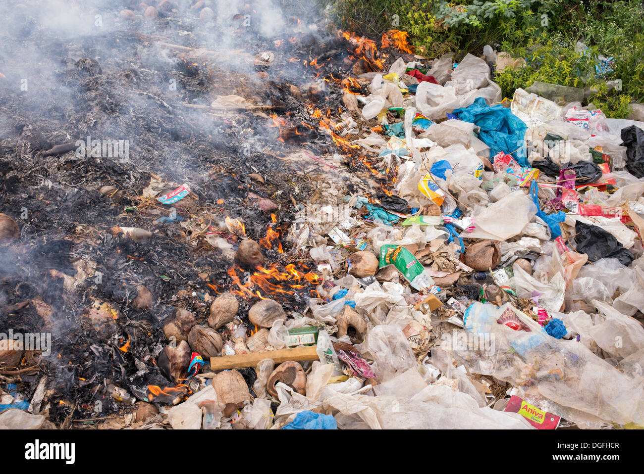 Burning plastic waste in the Indian countryside Stock Photo