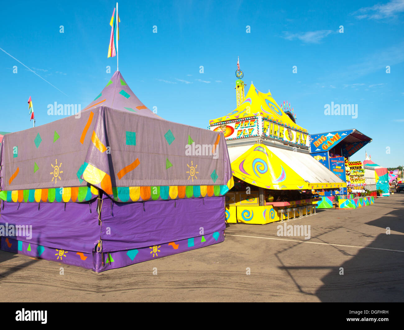 colorful tent covers for games at a fair before opening time Stock Photo