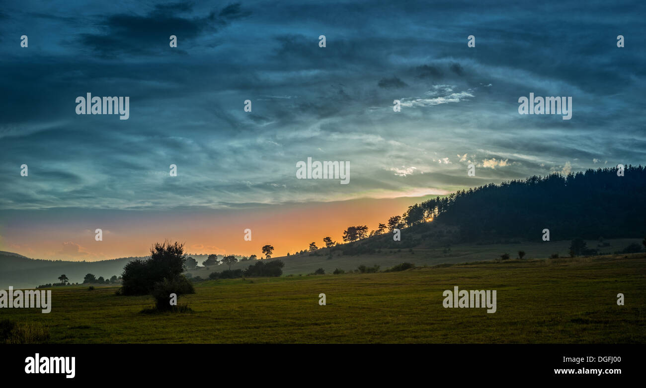 Cloud Cloudscape Scenics Sun Panoramic Hill through Sunbeam Valley Landscape Sky Sunset Light Sunlight Nature Green Dramatic Sky Stock Photo