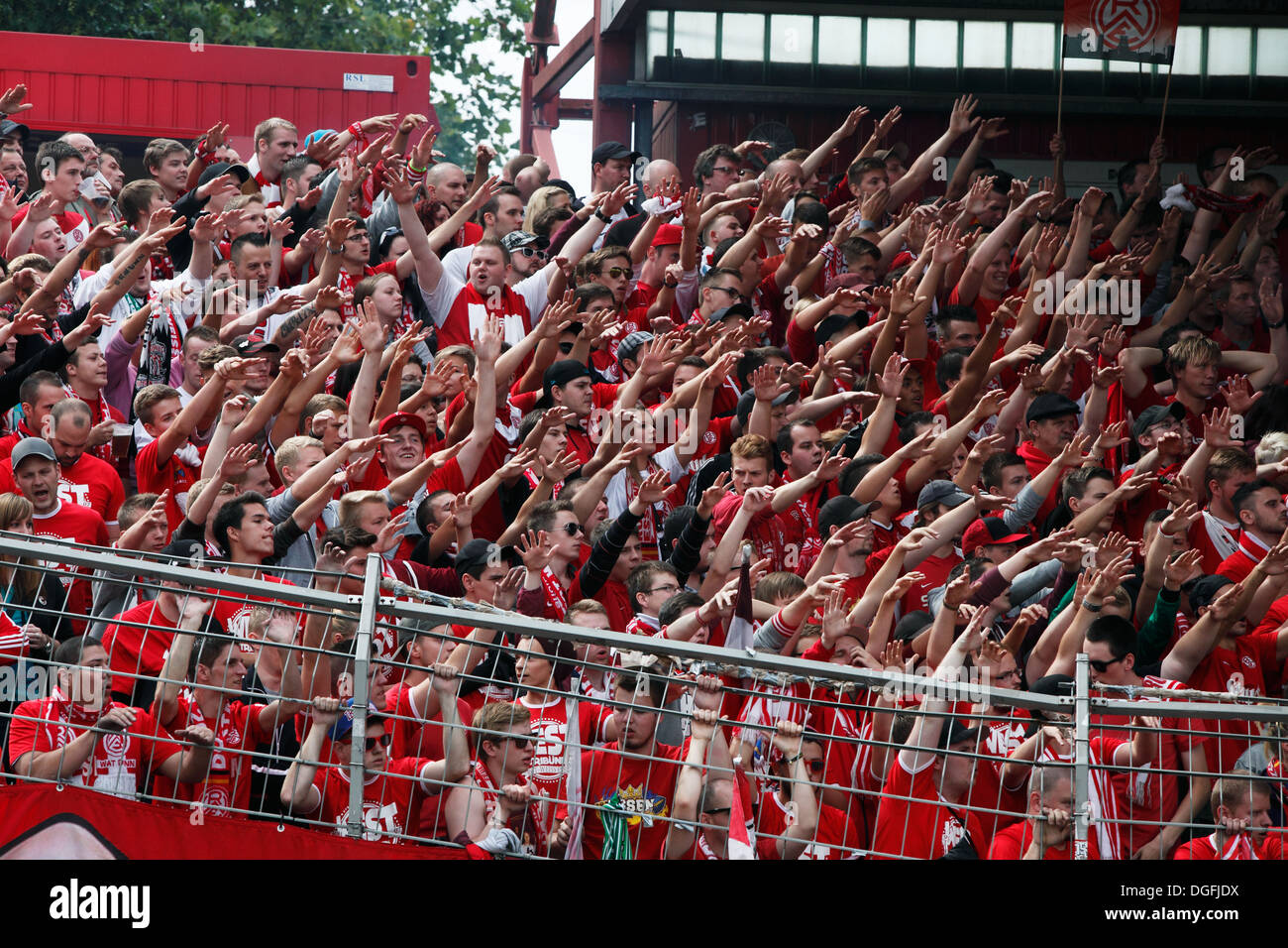 sports, football, Regional League West, 2013/2014, Rot Weiss Oberhausen versus Rot Weiss Essen 2:0, Stadium Niederrhein in Oberhausen, spectators, football fans of RW Essen, spurring on Stock Photo