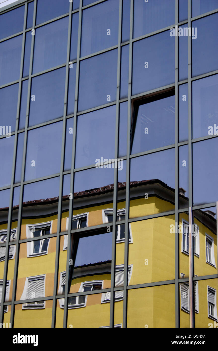 House reflected in a glass front. Spittal, Carinthia (Kärnten), Austria