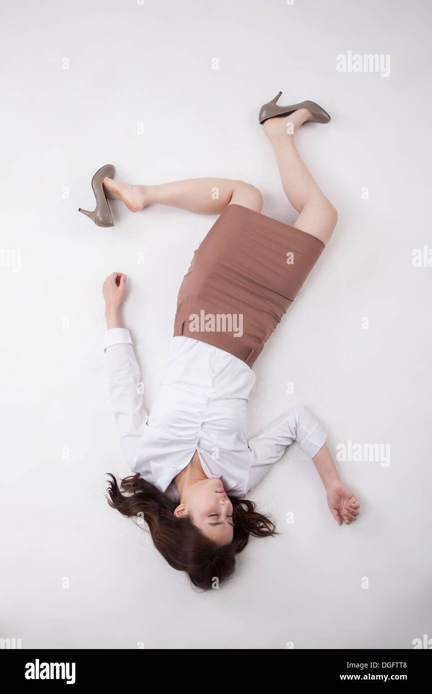 a business woman lying on the floor Stock Photo 61814376 Alamy