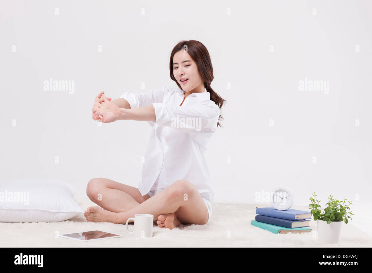 Woman sleeping on floor hi-res stock photography and images - Alamy