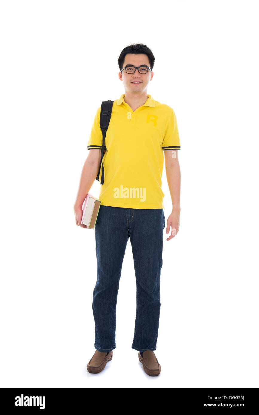 Young Asian student using pad PC isolated on white background. Stock Photo