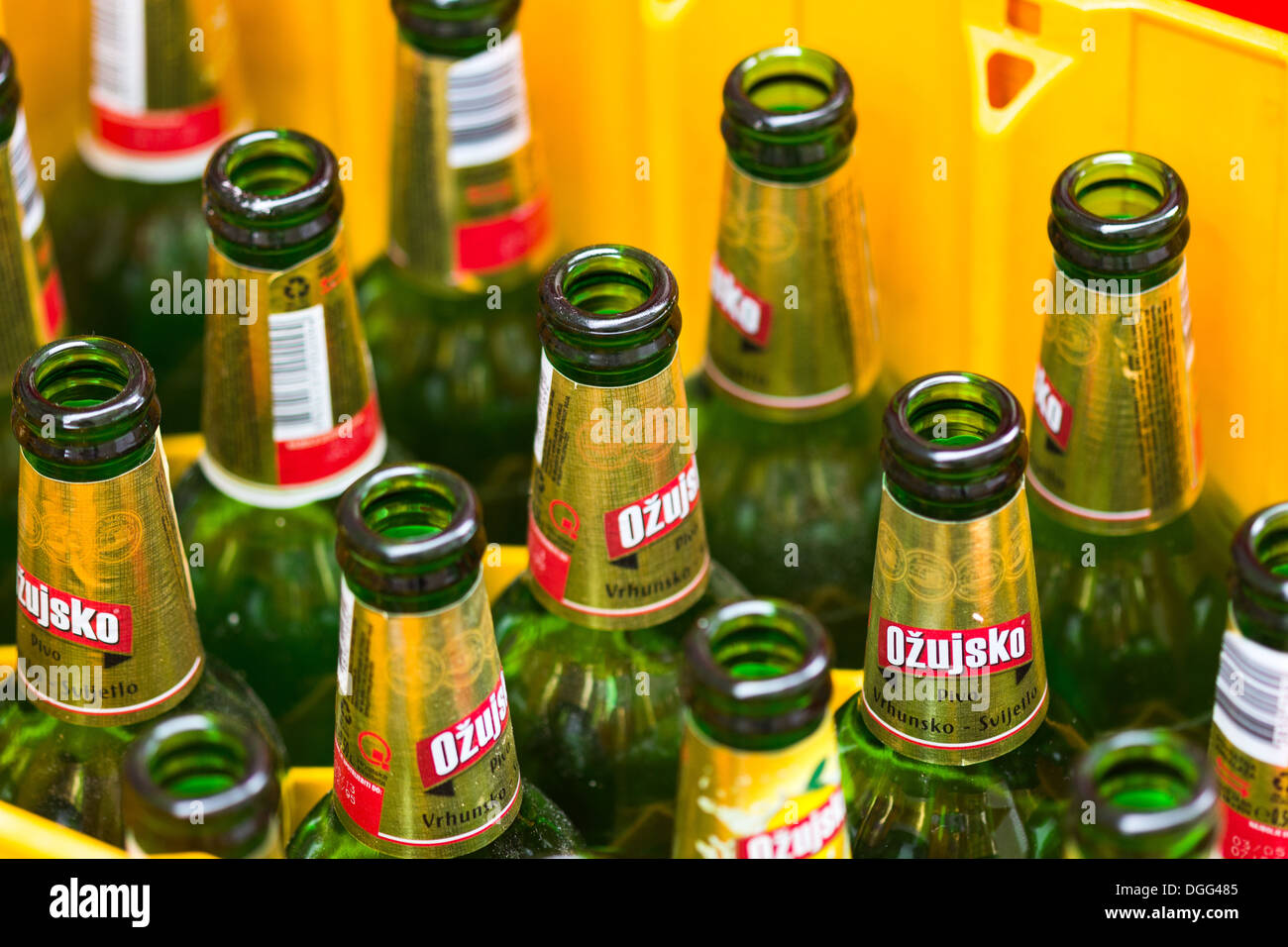 Empty beer glass bottles in plastic crate. Korcula Stock Photo