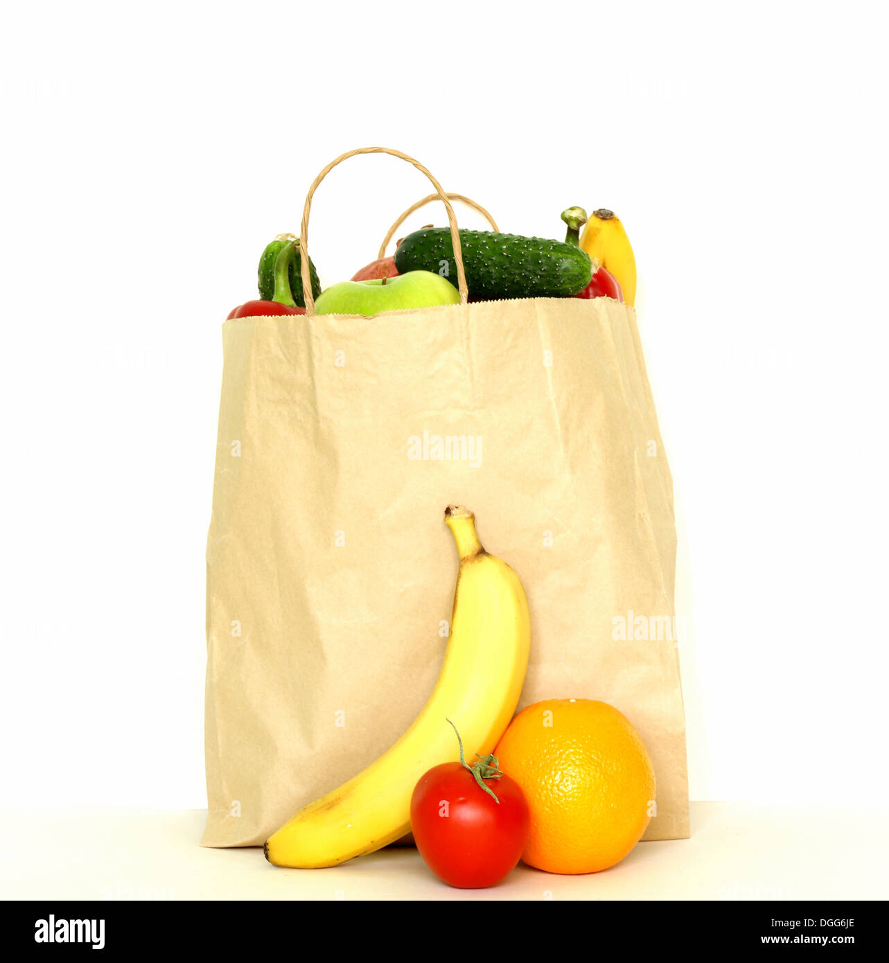 set of different convenience food (vegetables fruit) in a paper bag Stock Photo