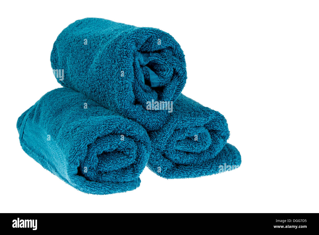 Rolled up dark blue towels isolated on white background Stock Photo Alamy