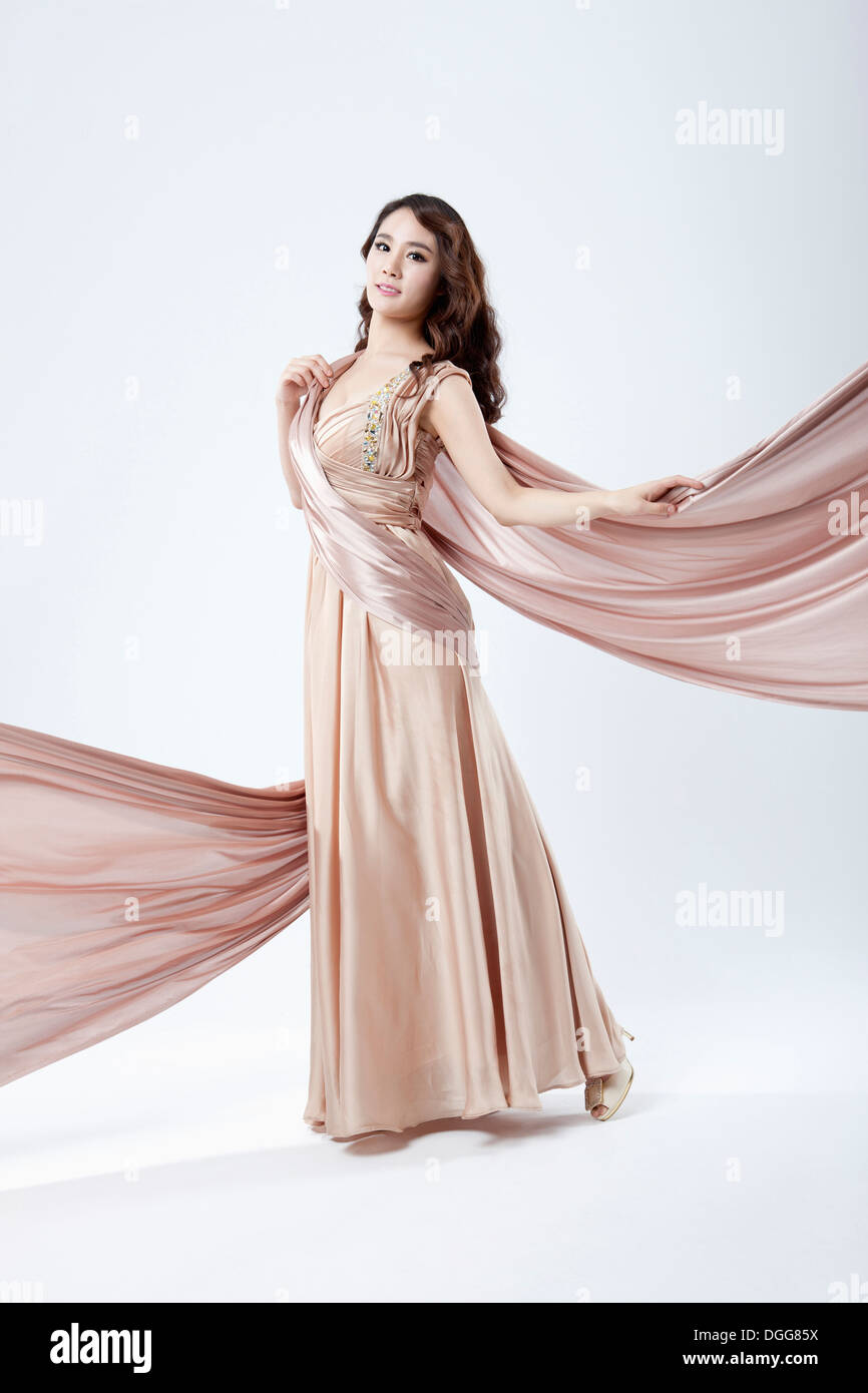 Woman in brown dress hi-res stock photography and images - Alamy
