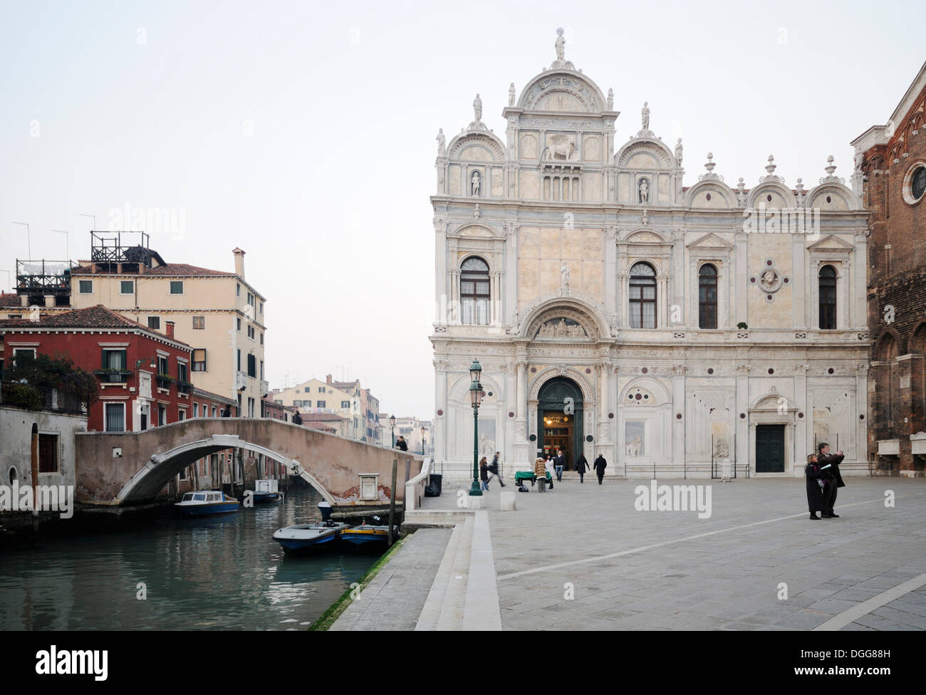 Scuola Grande di San Marco, Ponte del Cavallo bridge, canal Rio di San Lazzaro dei Mendicanti, Castello quarter, Venice, Venezia Stock Photo