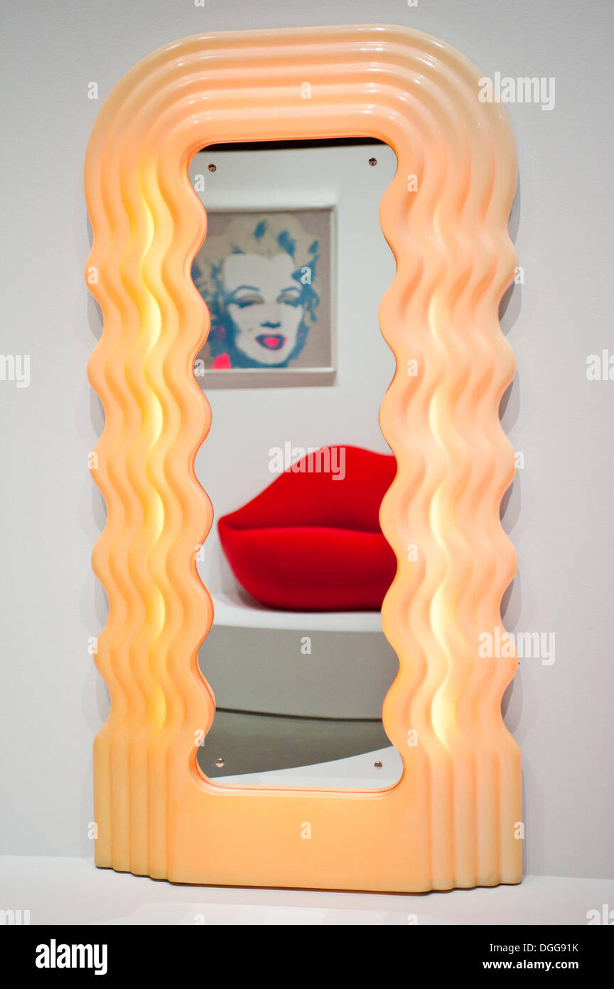 London, UK - 21 October 2013: 'Ultrafragola 1970' by Ettore Sottsass reflects a Marilyn Monroe portrait by Andy Warhol and 'La Bocca' by Studio 65  during the Pop Art Design exhibition at Barbican gallery in London. Credit:  Piero Cruciatti/Alamy Live News Stock Photo