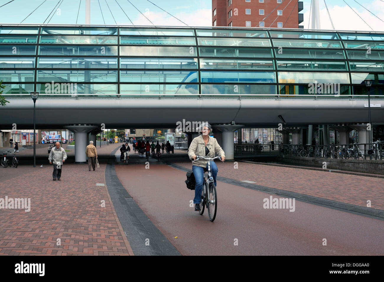 Cyclists in Houten's traffic-free town centre, a Dutch new town near Utrecht, The Netherlands. Stock Photo