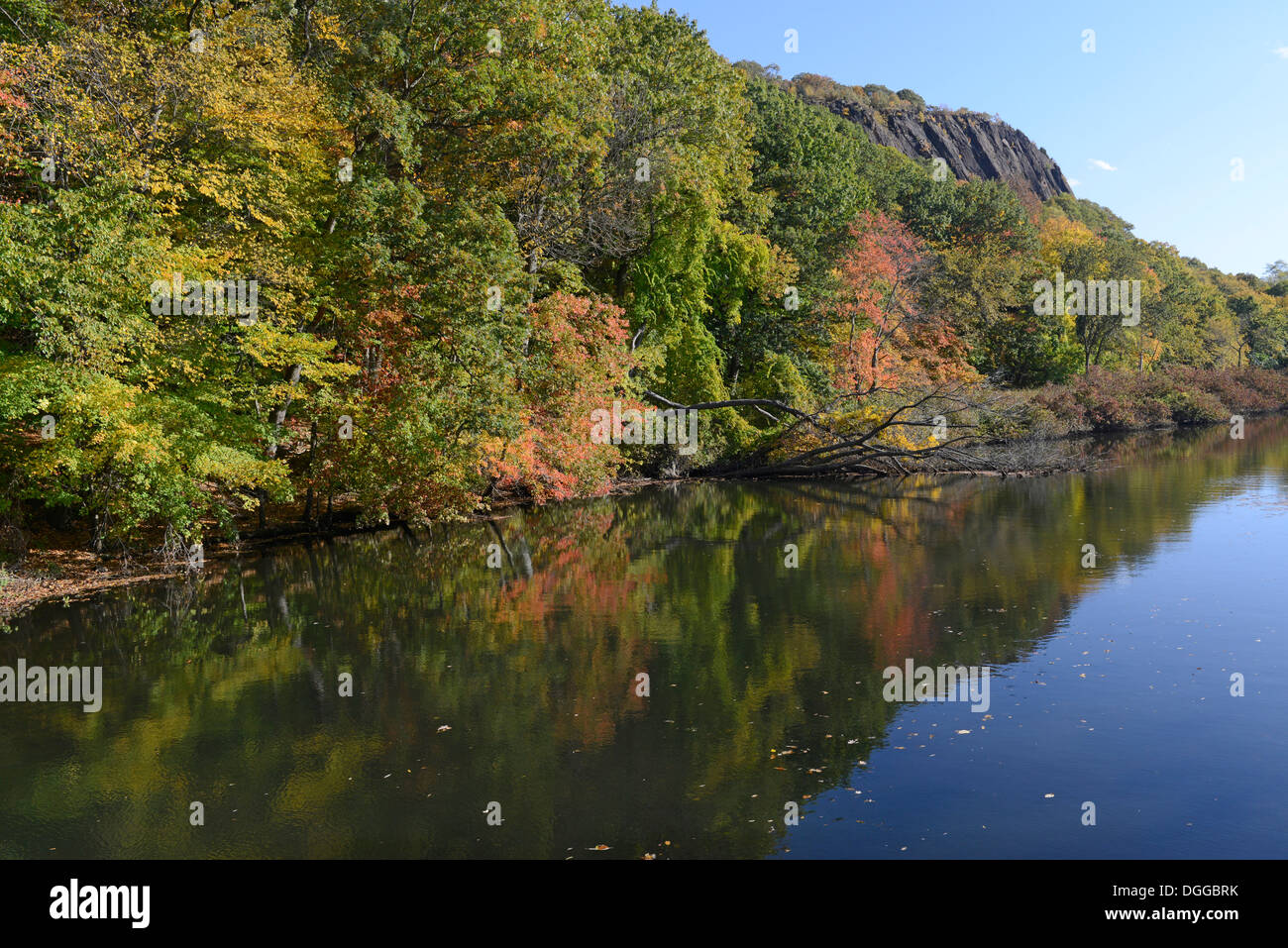 Fall on the Mill River.  East Rock Park.  New Haven, CT.  Dolerite, or traprock structure left after soft sandstone eroded. Stock Photo