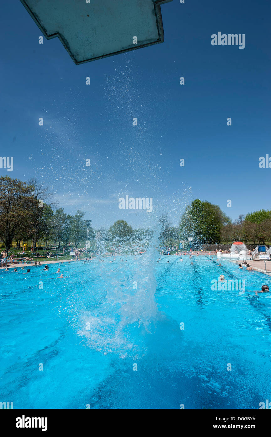 Splash after diving into a public swimming pool, Moehringer Freibad, Stuttgart, Baden-Wuerttemberg Stock Photo