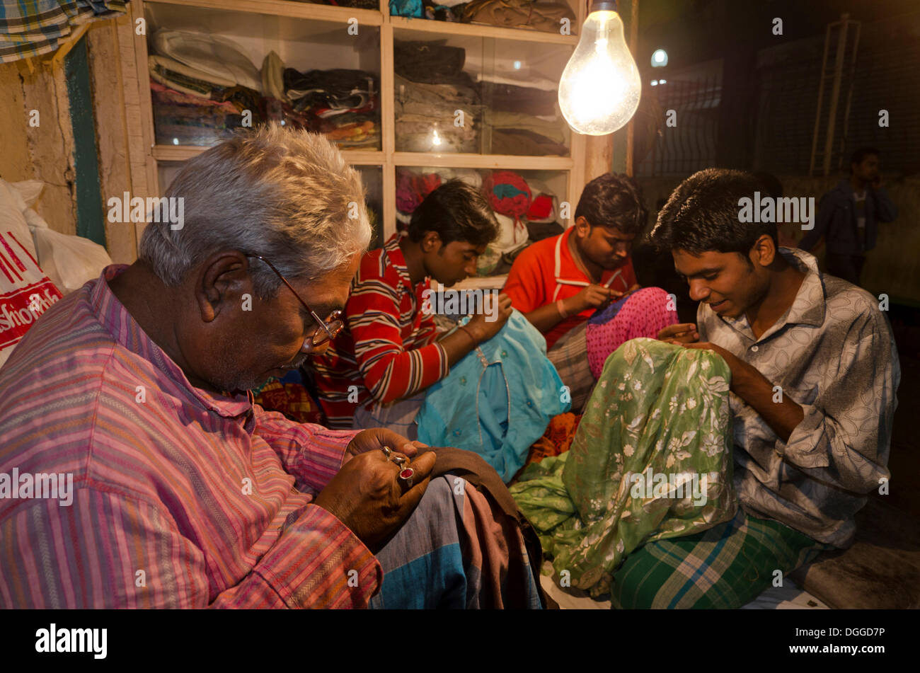 Tailors working at night, Kolkata, India, Asia Stock Photo