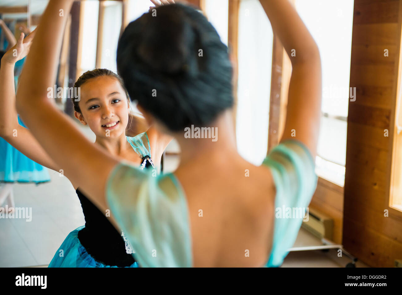 Ballerinas practising in dance studio Stock Photo