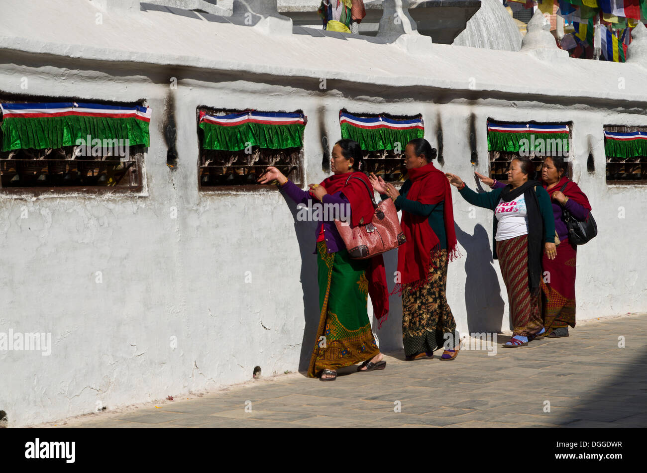 Pilgrims walking around Boudnath Stupa, turning prayer wheels, Kathmandu Valley, Kathmandu, Kathmandu District, Bagmati Zone Stock Photo