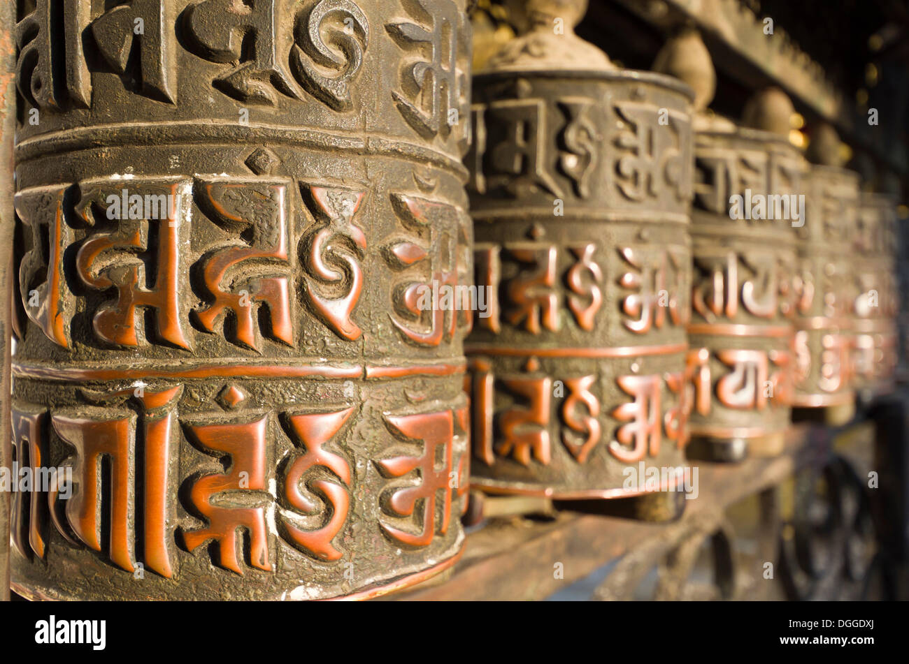 Buddhist prayer wheels at Swayambhunath Stupa, Monkey Temple, Kathmandu Valley, Kathmandu, Kathmandu District, Bagmati Zone Stock Photo