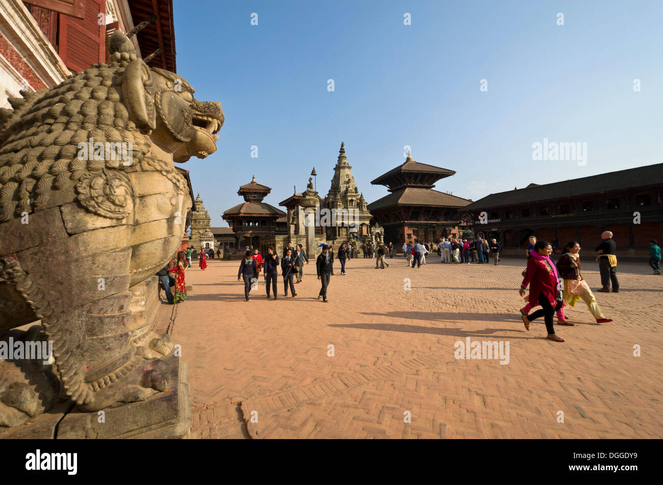 People walking on Durbar Square, the Lion Gate at front, Kathmandu Valley, Bhaktapur, Kathmandu District, Bagmati Zone, Nepal Stock Photo