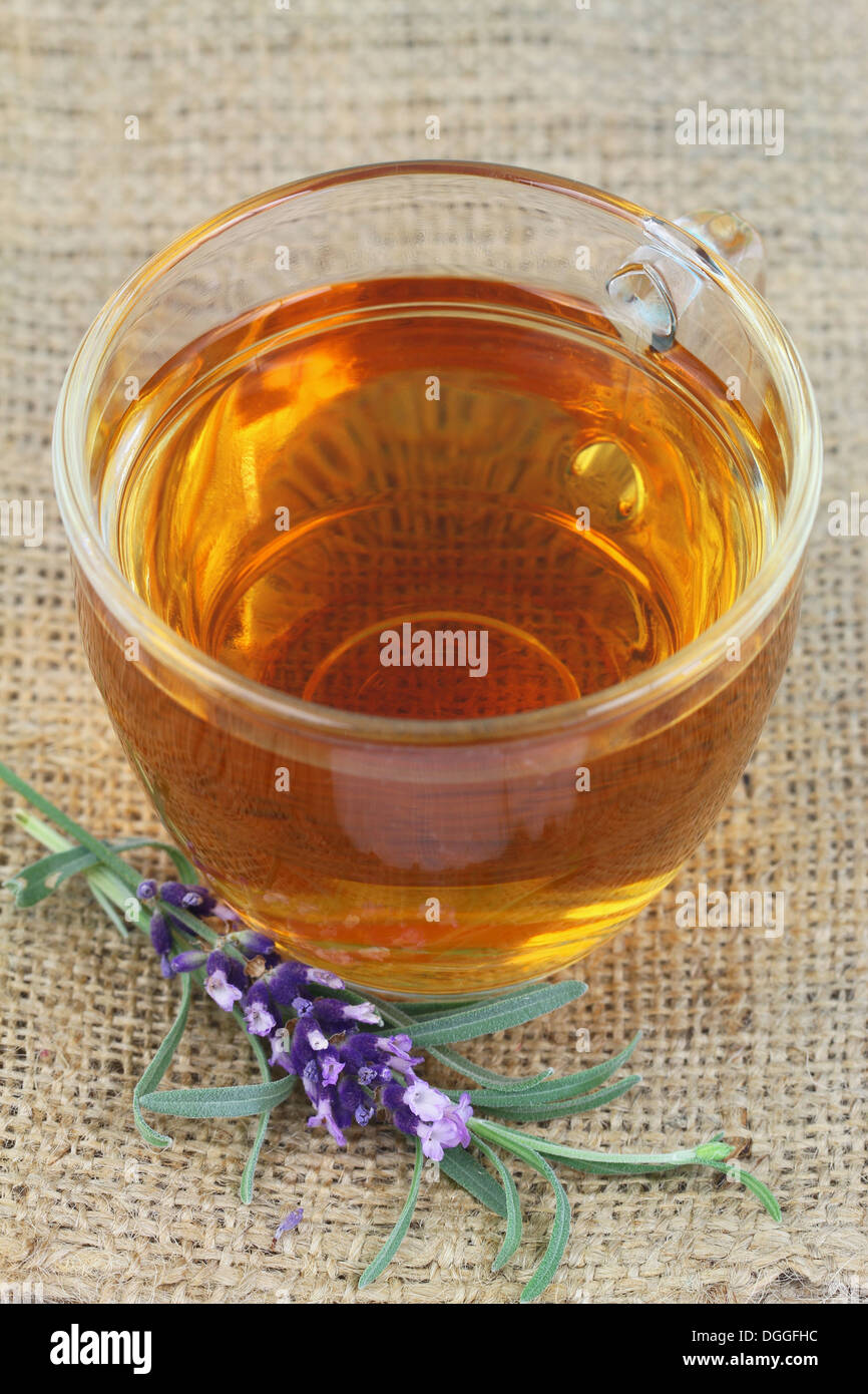 Lavender tea on jute surface Stock Photo - Alamy