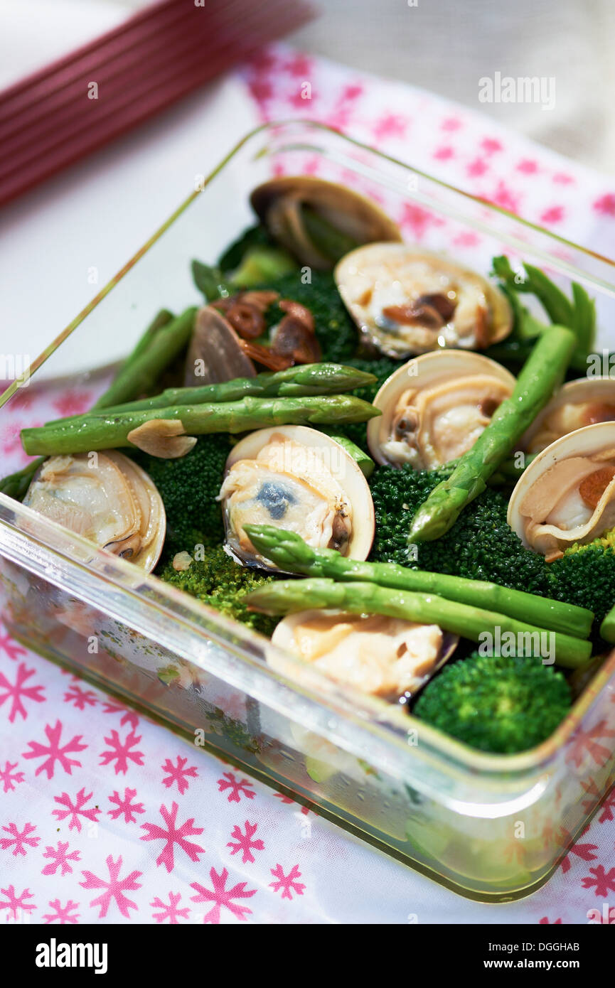 Fresh Japanese cuisine with asparagus, seafood and broccoli Stock Photo