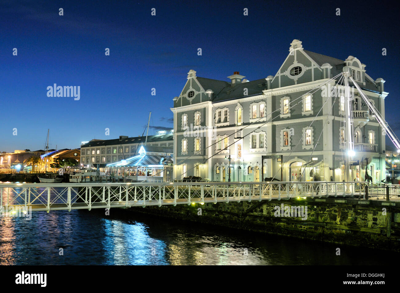 Swing Bridge and renovated commercial station, African trading port, at night, Waterkant district, V & A Waterfront, Cape Town Stock Photo
